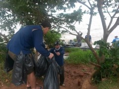 Pescadores recolhendo lixo as margens do Rio Sucuruí (Foto: Apetl - Associação de Pesca Esportiva de Três Lagoas)