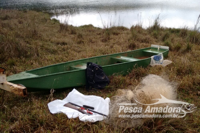 PMA combate a pesca predatória e apreende barco, arma e nove redes no Rio Grande em MG